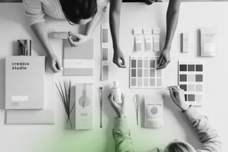 Emphasizes the collaboration and the types of physical materials used in a branding or design session.