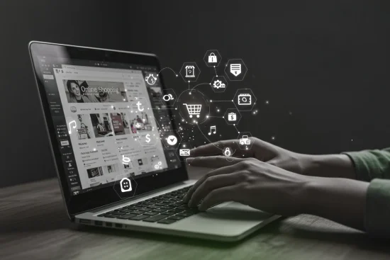 Hands typing on a laptop surrounded by digital icons representing the benefits of content marketing like shopping, social engagement, and data.