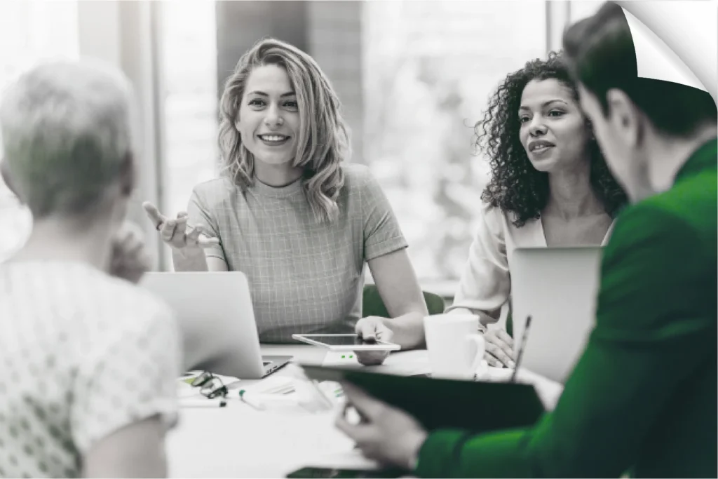 Business meeting where consultants discuss strategy and client solutions with effective teamwork.